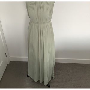 Floor length, emerald green pleated dress